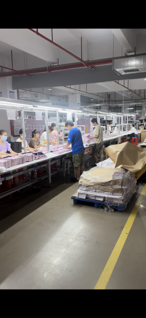 Packaging box assembly line at Xiangmai factory