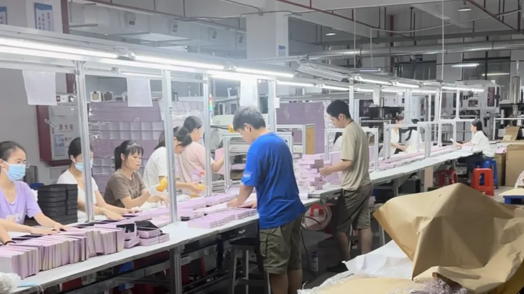Packaging box assembly line at Xiangmai factory